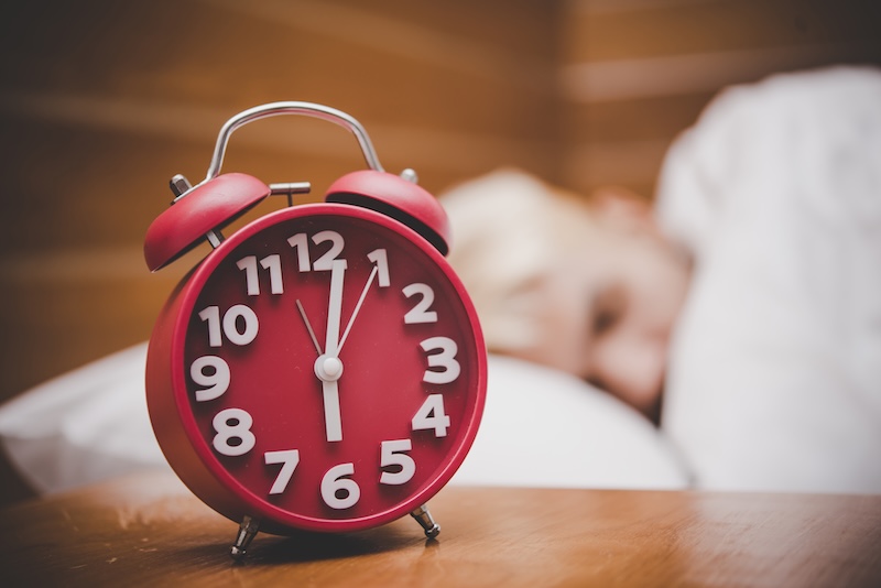 red alarm clock in the morning, wake up time to go work.